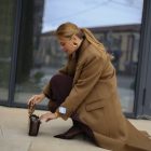 Пальто в темно-бежевому кольорі 9