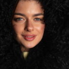 Шуба з хутра лами в чорному кольорі 15